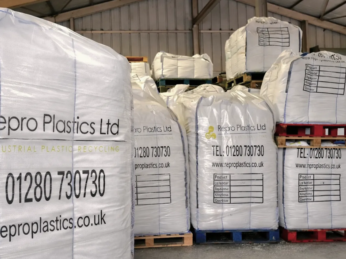 Bulk bags of recycled plastic material stored at Repro Plastics